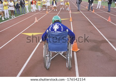 Wheelchair Special Olympics athlete from behind, UCLA, CA