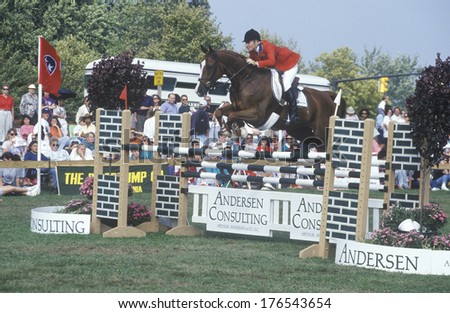 Horse and rider clearing hurdle in American CafÃ?Â?Ã?Â½ Grand Prix, Howard Community College, Columbia, Maryland