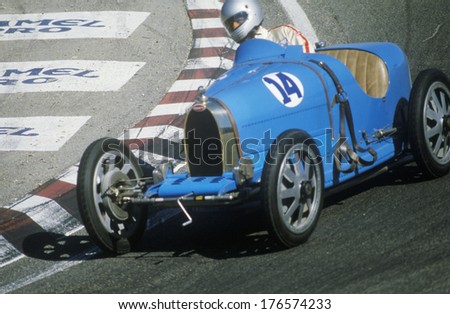Racing a classic Bugatti sports car at the Laguna Seca Classic Car Race in Carmel, CA