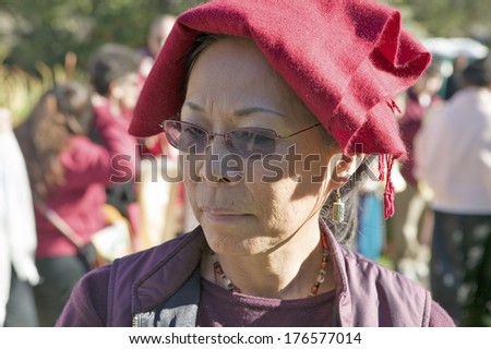 Devotee with prayer shawl attends Amitabha Empowerment Buddhist Ceremony at Meditation Mount in Ojai, CA