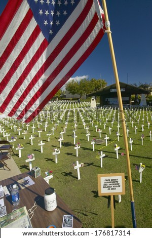 American flag at mock cemetery honoring 1500+ Iraqi servicemen killed in Iraq War, Ventura California