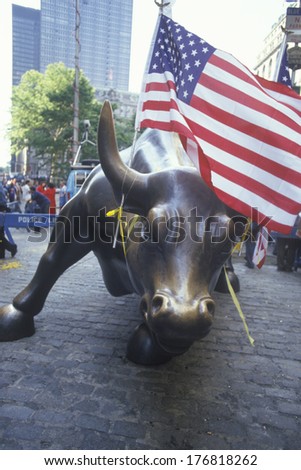 American Flag Tied to Sculpture of Bull, Wall Street, New York City, New York