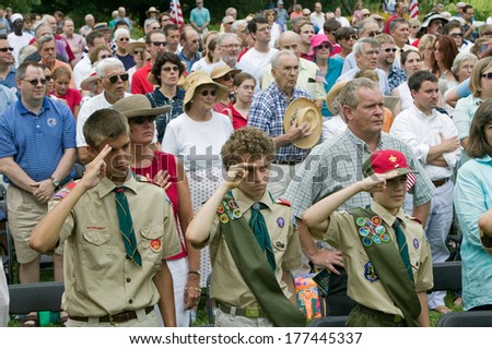 Boy scouts salute for American citizens at Independence Day Naturalization Ceremony on July 4, 2005 at Thomas Jefferson\'s home, Monticello, Charlottesville, Virginia.