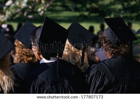 This is a college graduation ceremony at UCLA. They are in black caps and gowns.