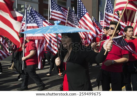 US Flags as kids Celebrate Chinese New Year, 2014, Year of the Horse, Los Angeles, California, USA, 02.01.2014