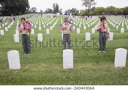 Boyscouts place one of 85, 000 US Flags at 2014 Memorial Day Event, Los Angeles National Cemetery, California, USA, 05.24.2014