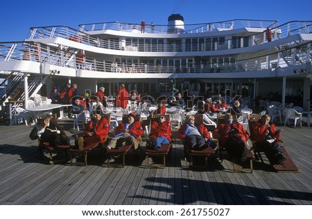 Travelers in deck chairs on deck of cruise ship Marco Polo, Antarctica