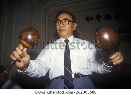 Musician with maracas in Old Jazz Band at Peace Hotel, Shanghai, People\'s Republic of China