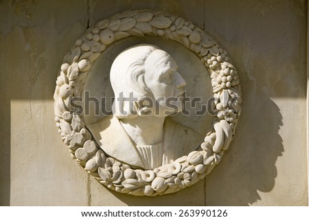 Columbus\' monument - Monumento a ColÃ?Â¢??n, an oval sculpture and portrait of Christopher Columbus the Discover of the New World, Sevilla, Spain, was commissioned in 1911 by King Alfonso XIII