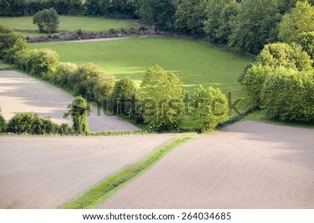 Convergence of farm fields in Sare, France in Basque Country on Spanish-French border, a hilltop 17th century village in the Labourd province, close to St. Jean de Luz, on the Cote Basque, France.