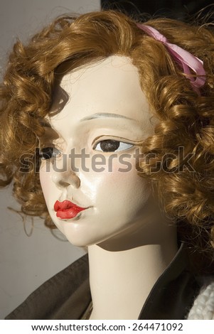 Close up of mannequin woman with red hair and red lipstick, Barcelona, Spain