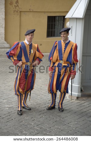 Brightly colored uniforms of Swiss Guard at Vatican City, center of Catholic Church, Rome, Italy, Europe