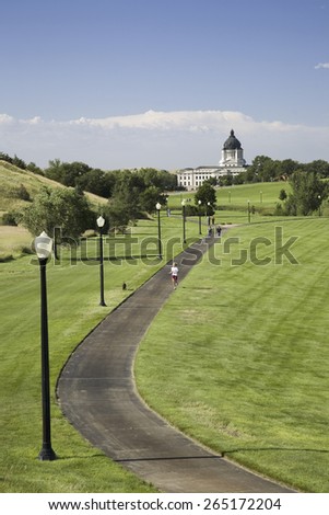 Jogging track in city park leading to South Dakota State Capitol and complex, Pierre, South Dakota