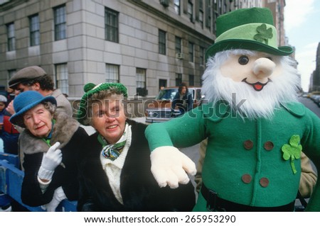 Parade watchers and Leprechaun at the 1987 St. Patrick\'s Day Parade, NY City