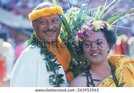 A couple wearing Polynesian costumes for Hawaiian Unity Day, Ho\' Olokahi, HI