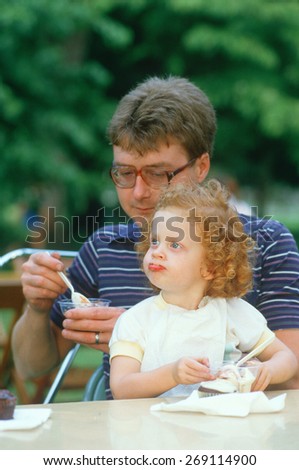 A father and daughter eating ice cream, Westfield, NY