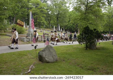 Concord Minutemen Revolutionary reenactors march through cemetery to honor veterans on Memorial Day, 2011, Concord MA