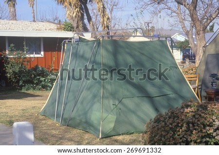 A tent set up in a yard housing people displaced by the Northridge earthquake in 1994