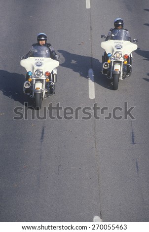Motorcycle police officers riding on freeway, Washington D.C.
