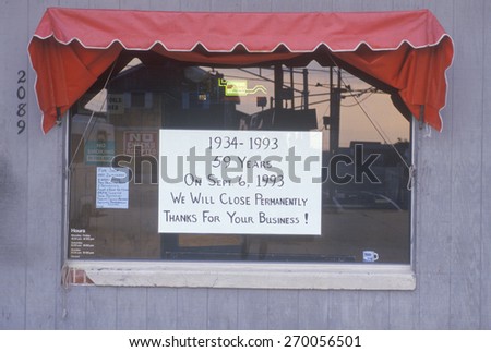 Closed for business sign on window, New Jersey Shore