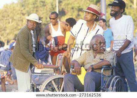 African American family with man in wheelchair, Los Angeles, CA