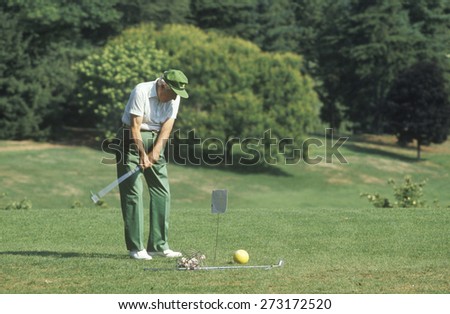 Senior golfer on course, Columbia Country Club, Bethesda, Maryland