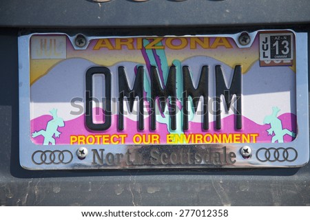 Arizona License plate saying OMMMM