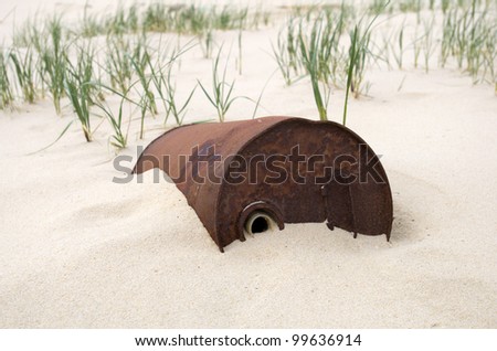 Rusty oil drum in the desert