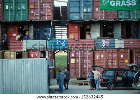 BELARUS, MINSK-August 29, 2013: people work on the stock of the different transport containers.