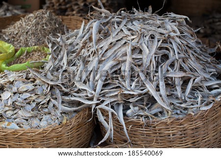 large basket of dried fish Indian Ocean for sale at an outdoor market in Sri Lanka