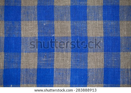 texture of a linen napkin pattern red square