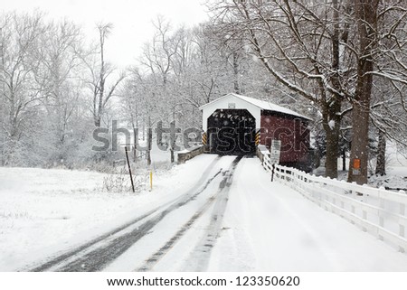 Snowing at a covered bridge in Lancaster County,Pennsylvania,USA.