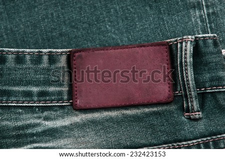 The texture of denim with leather tag