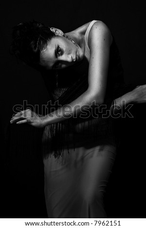 Body figure of a young dancer woman in black and white