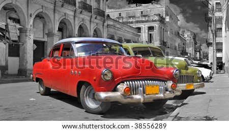 Panoramic view of colorful vintage classic cars parked in street of old Havana, cuba