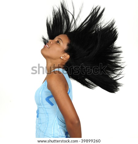 Portrait of young african american girl waving her hair - isolated