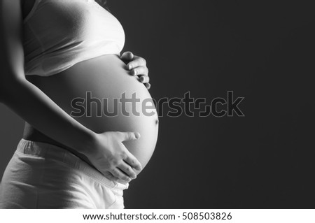 Similar – Image, Stock Photo Silhouette of a pregnant woman against an oceanic landscape