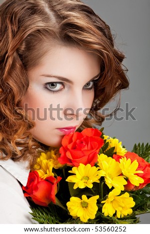 Elegant woman with a bouquet of flowers