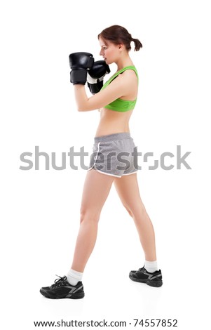young woman in boxing gloves on white background