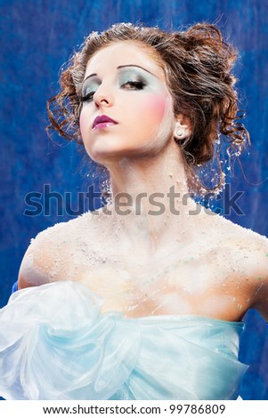 Beautiful girl like Snow White on blue background