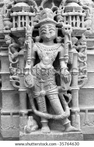 carved sculpture sculpted on the temple wall in a jain temple in jaisalmer, rajasthan