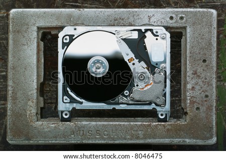 Subminiature hard-disc, or micro-drive detail. Used in cameras and MP3 player. Close-up photo.