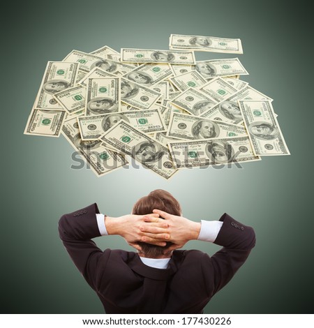 Businessman dreaming about money cash, dollars, . Concept of time is money,