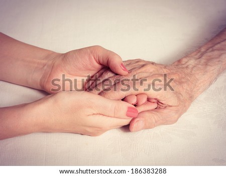 Care is at home of elderly. Elderly man, hands. Space for text