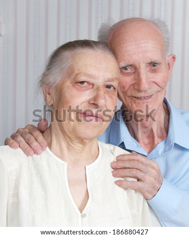 Closeup portrait of smiling elderly couple Old people holding hands. Concept of marital fidelity, reliability, care for elderly, love confession. Elderly man, woman. Couple love