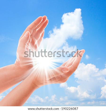 Man\'s hands reach for sky. Prayer at dawn  Hand concept.Two hands protecting something