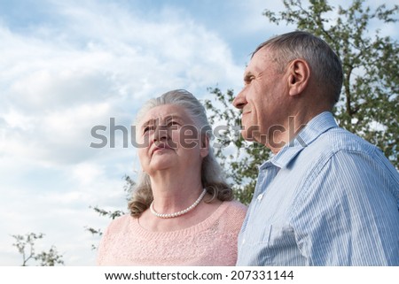 Happy and smiling senior couple in love. Happy couple portrait, closeup. Elderly couple walking.