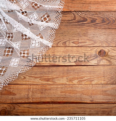 Wood texture, wooden table with white lace tablecloth tartan top view. Collage for menu