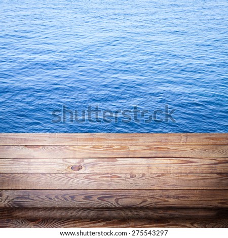 Wooden texture and Blue sea surface with waves, texture water mock for design