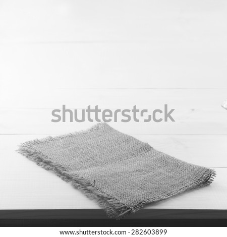 Empty wooden deck table with tablecloth for product montage. Kitchen interiors. Flat mock up for design. Black and White